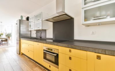 pretty-kitchen-with-yellow-kitchen-unit-and-hangin-2021-12-09-14-14-18-utc.jpg
